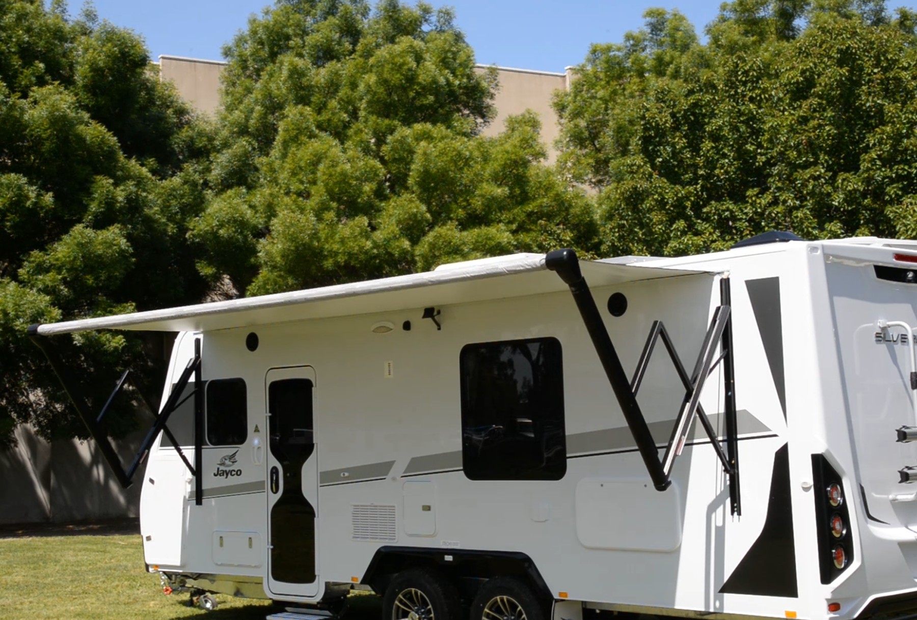 Electric awning for outlet camper